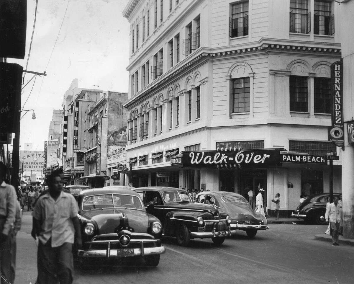 View of traffic on an unspecified street after post-war reconstruction, Manila, Philippines, 1950.
