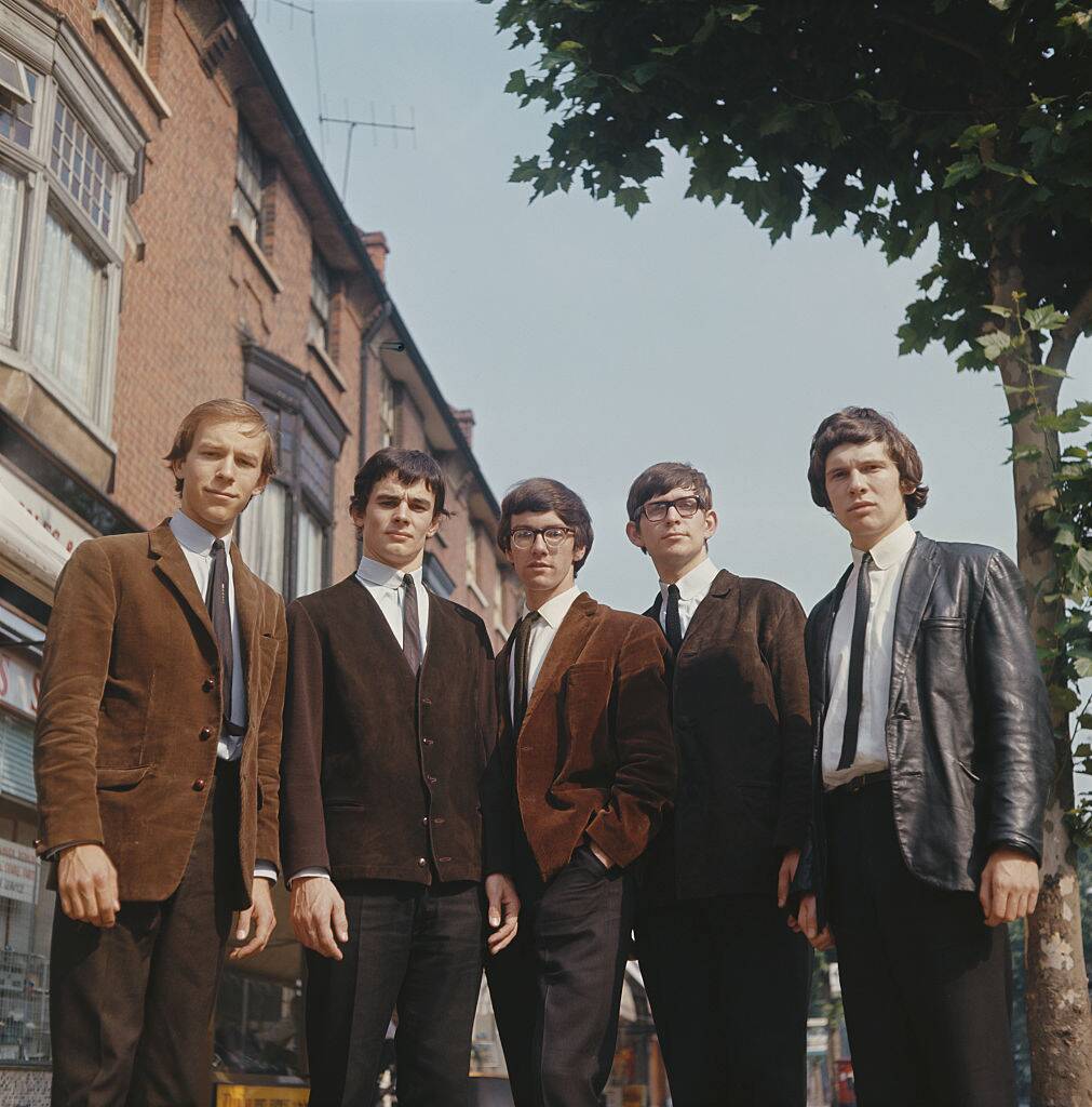 men in suits looking down