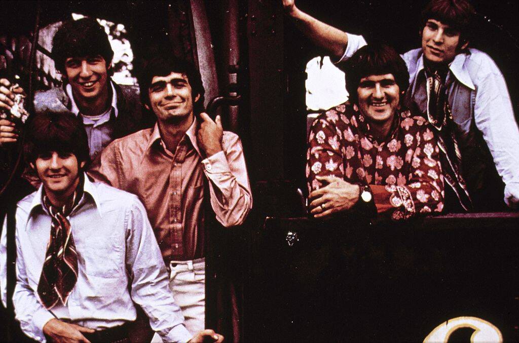 band posing for a photo