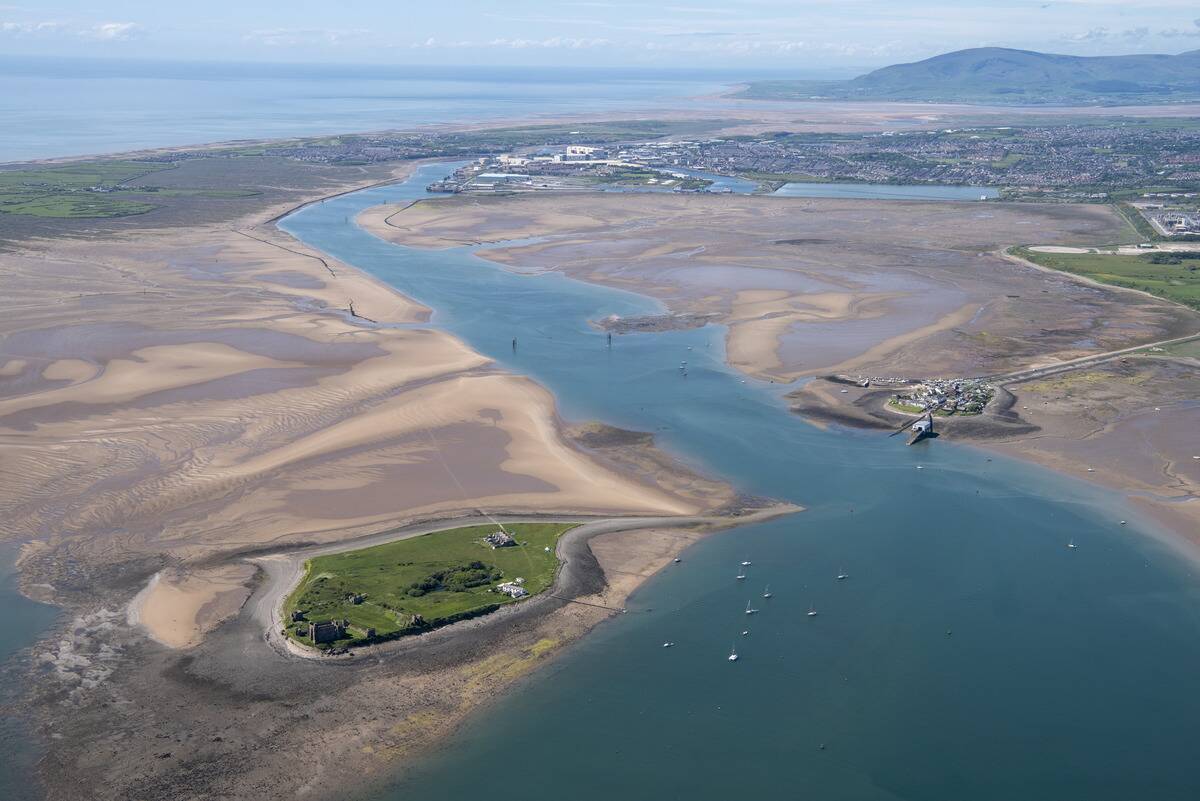 Piel And Roa Islands With Barrow-In-Furness And Black Combe Fell In The Background