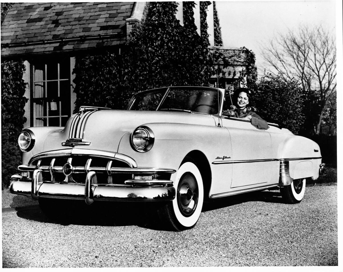 Woman Driving Pontiac Chieftain 8