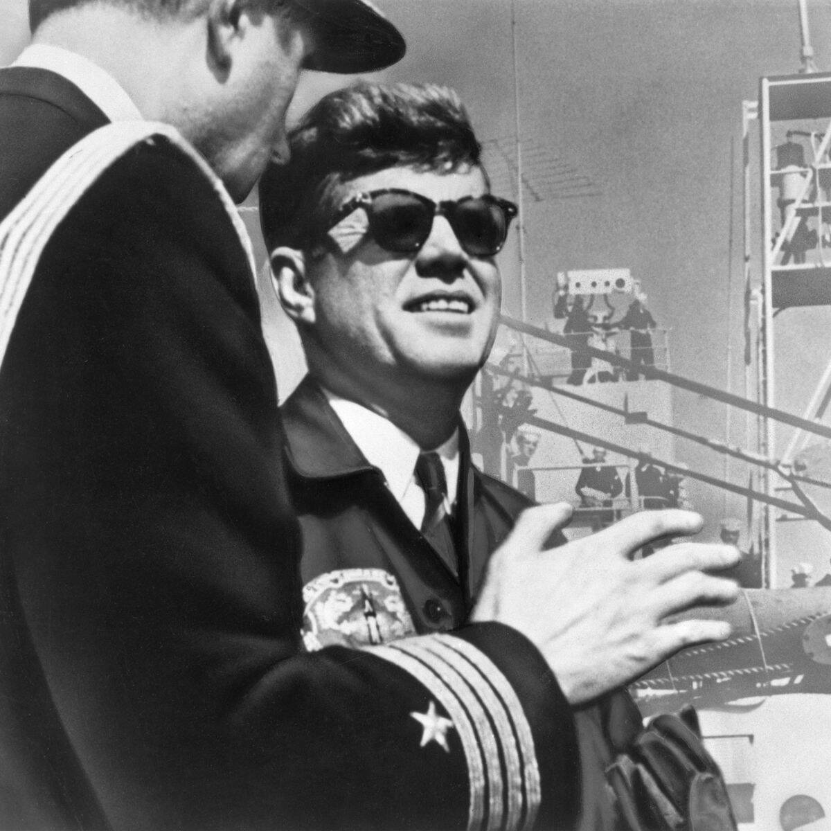 john-f-kennedy-wearing-sunglasses-aboard-naval-ship-with-news-photo-1676652816