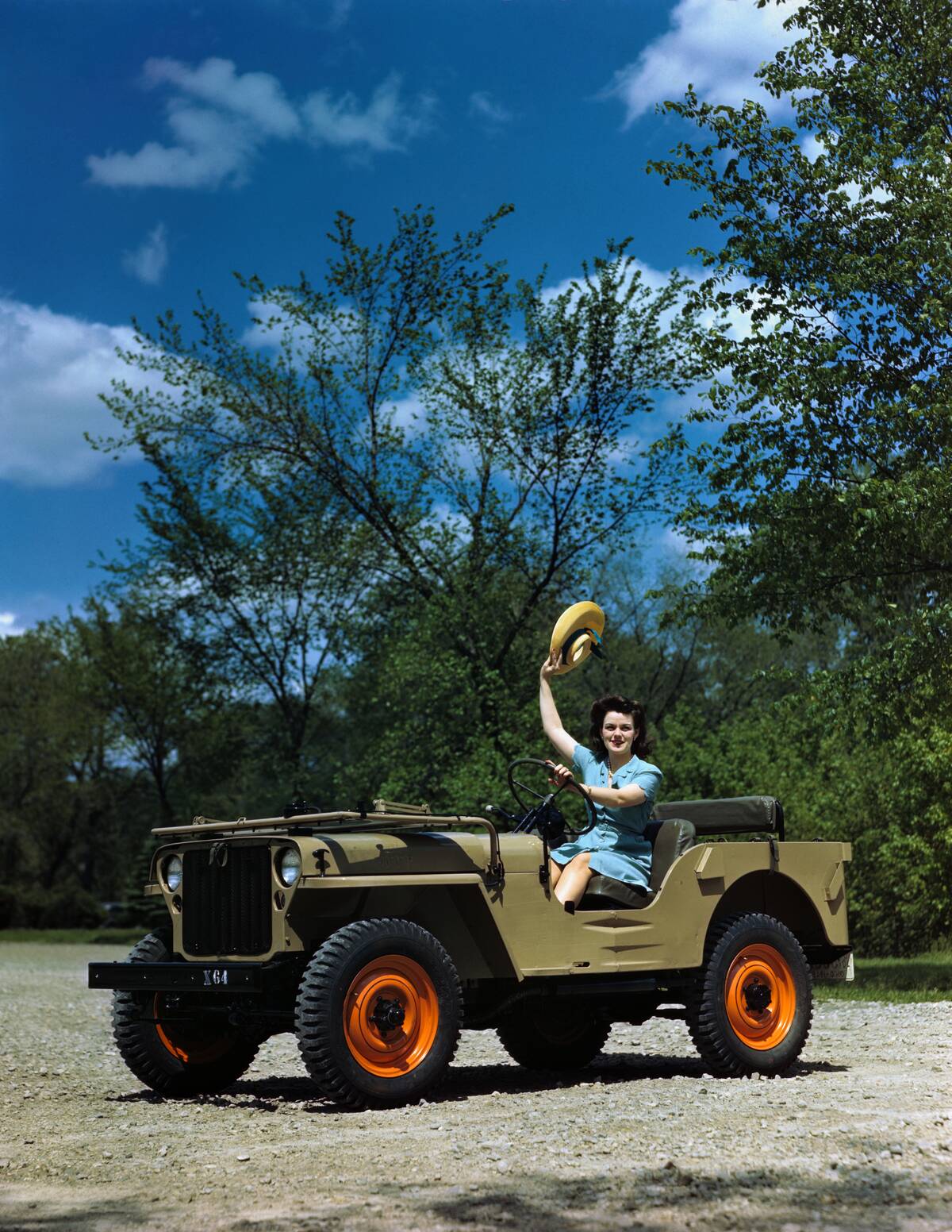 Woman Driving a Military Jeep
