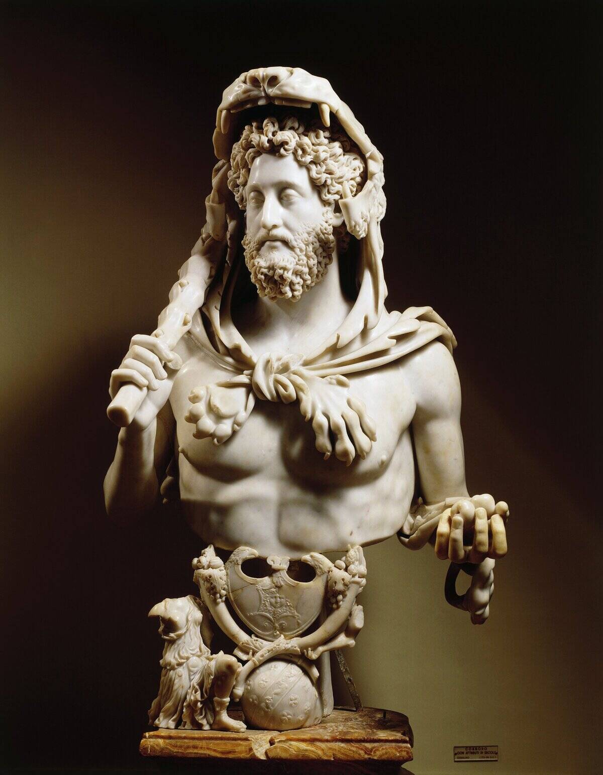 Emperor [redacted] (160-192) with Hercules' symbols, marble statue, from Esquilino hill
