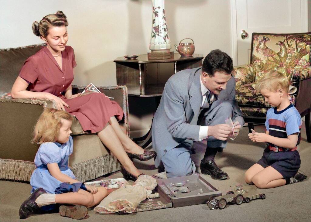 1940s family playing with a toy