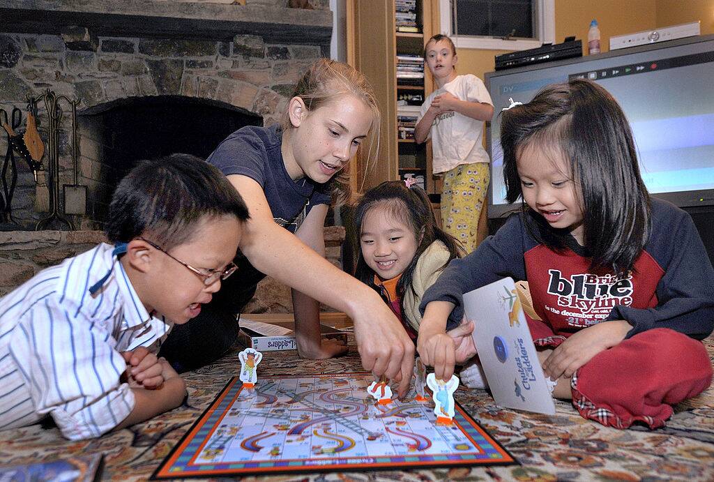 kids playing a board game