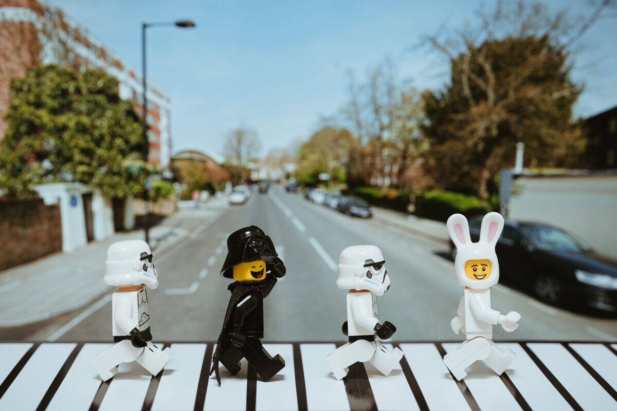 mini figures walking across a street