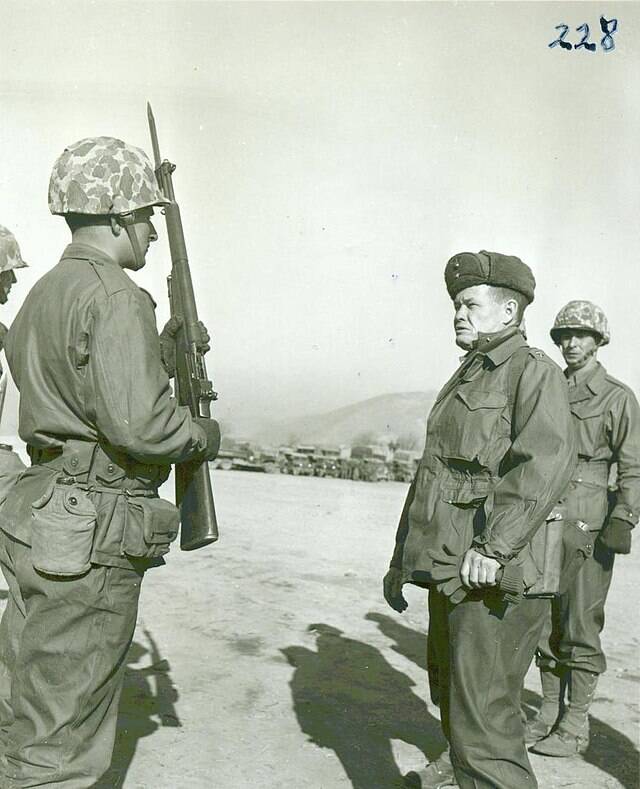 640px-Lewis_Puller_Inspecting_Guard,_1951_(15319327093)