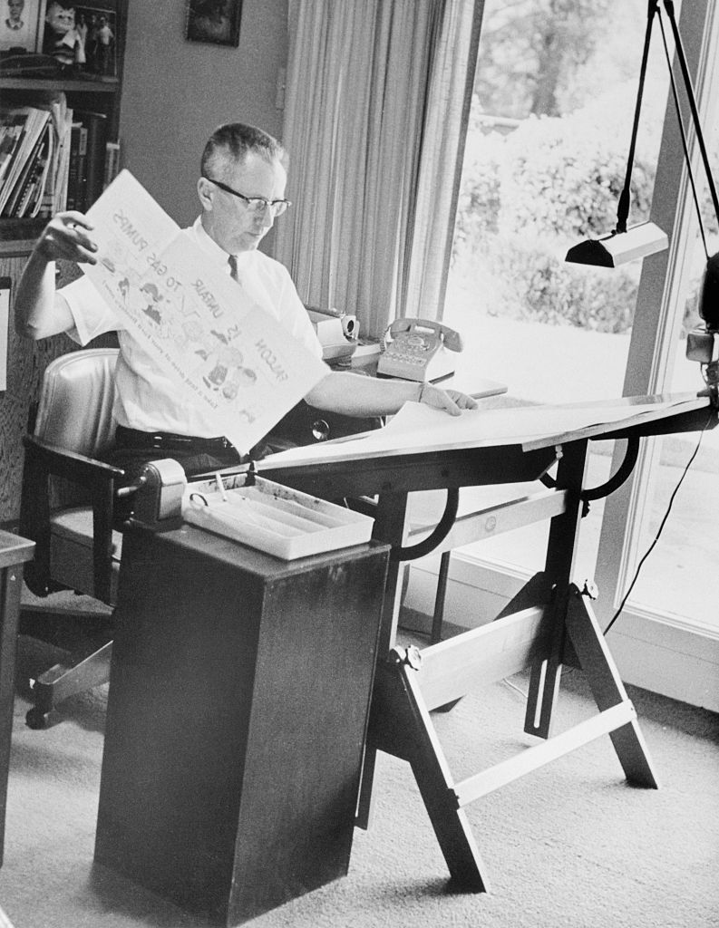 Schulz creating cartoons