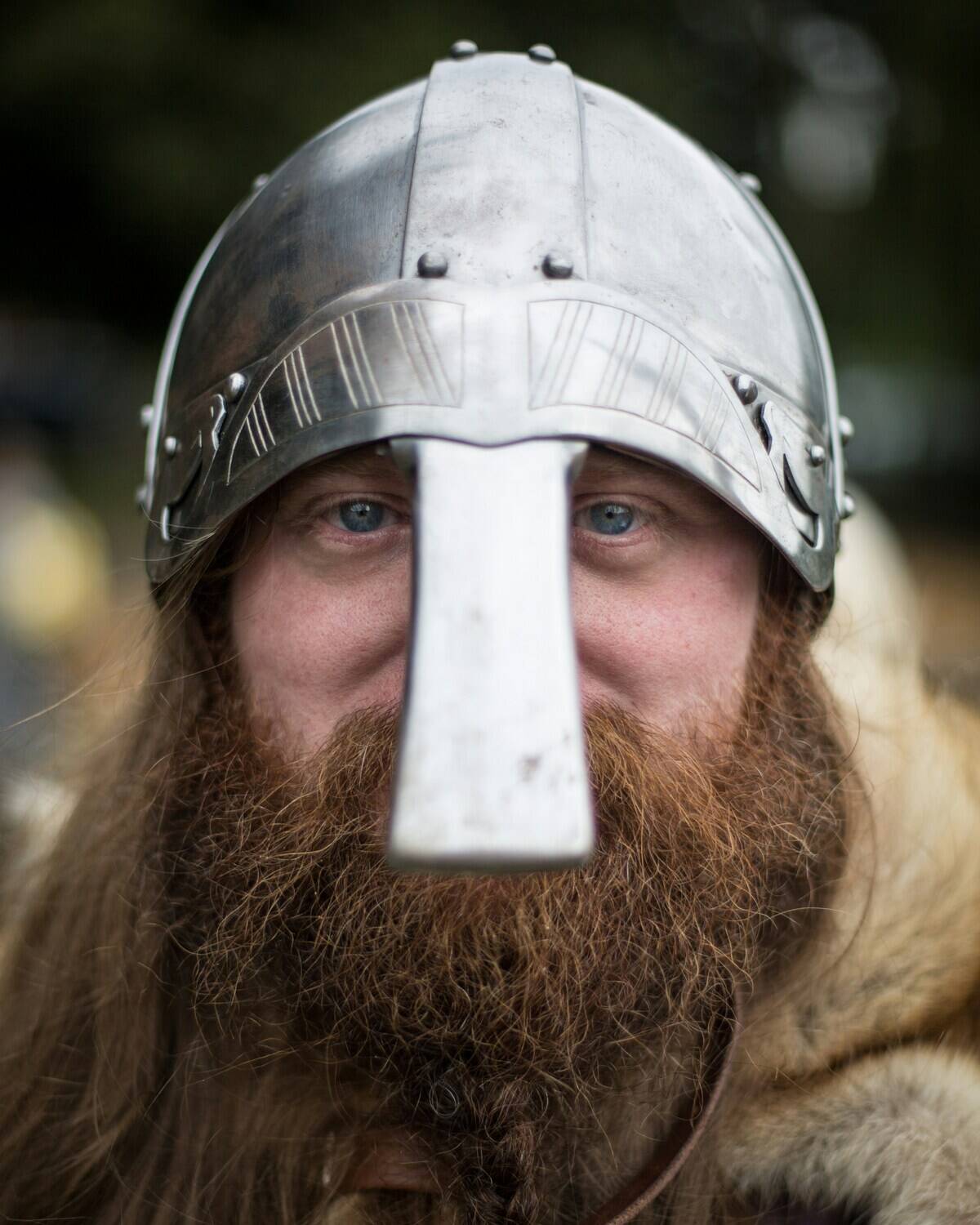 Viking wearing a helmet. 