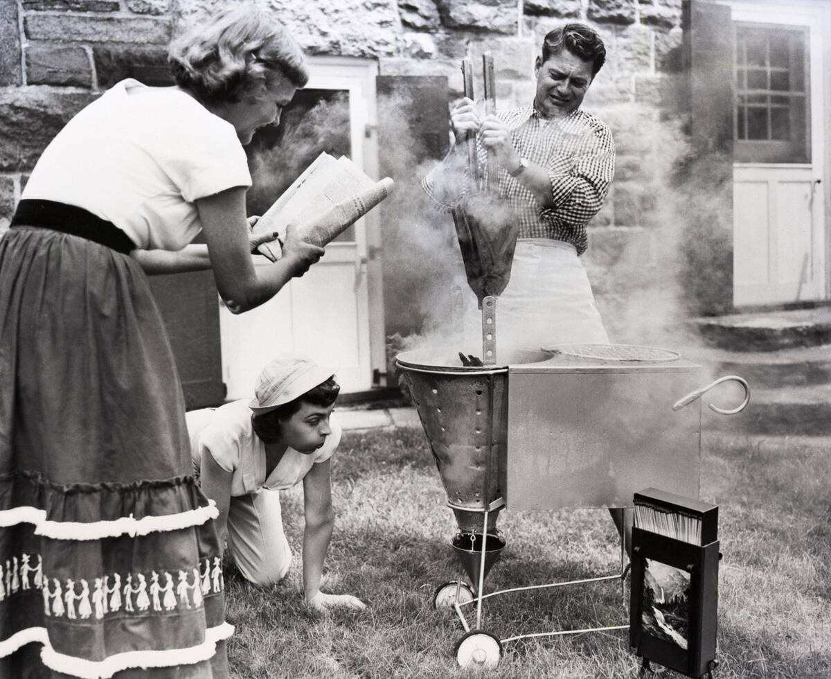 Friends Start a Barbecue Grill