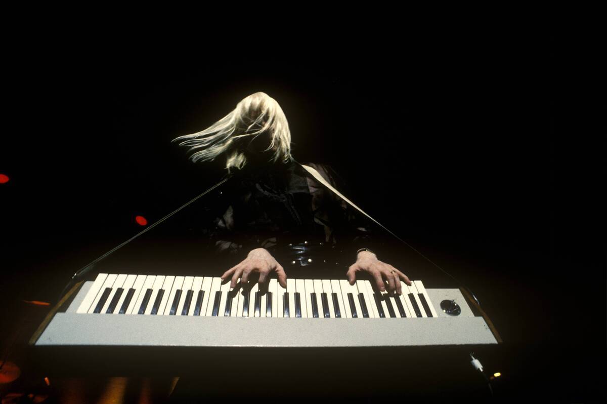 Photo of Edgar WINTER and [redacted] and KEYBOARD