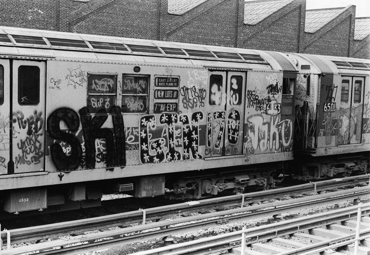 Exterior Of Subway Car Covered In Graffiti