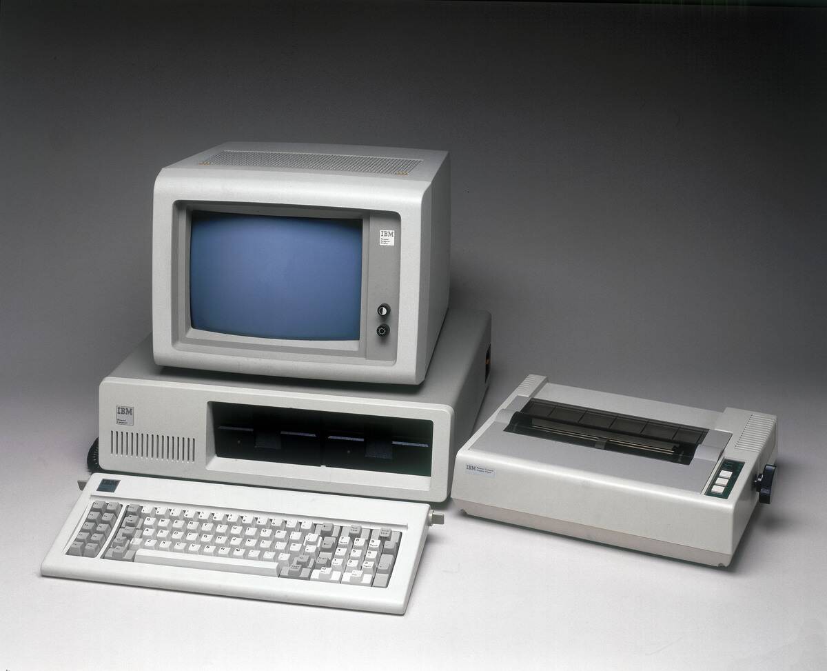 [redacted] with printer, 1981.