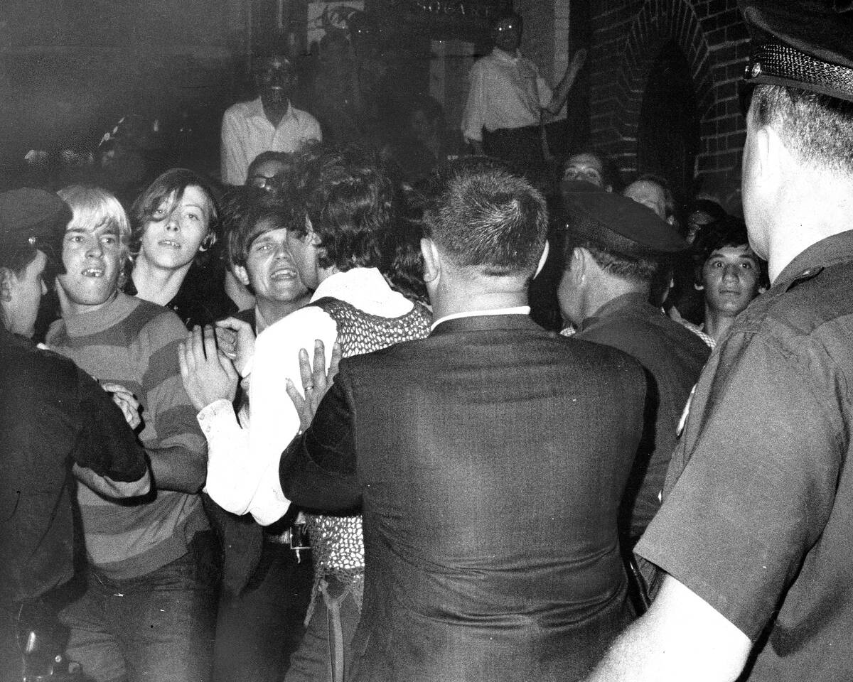 [redacted] nightclub raid. Crowd attempts to impede polic