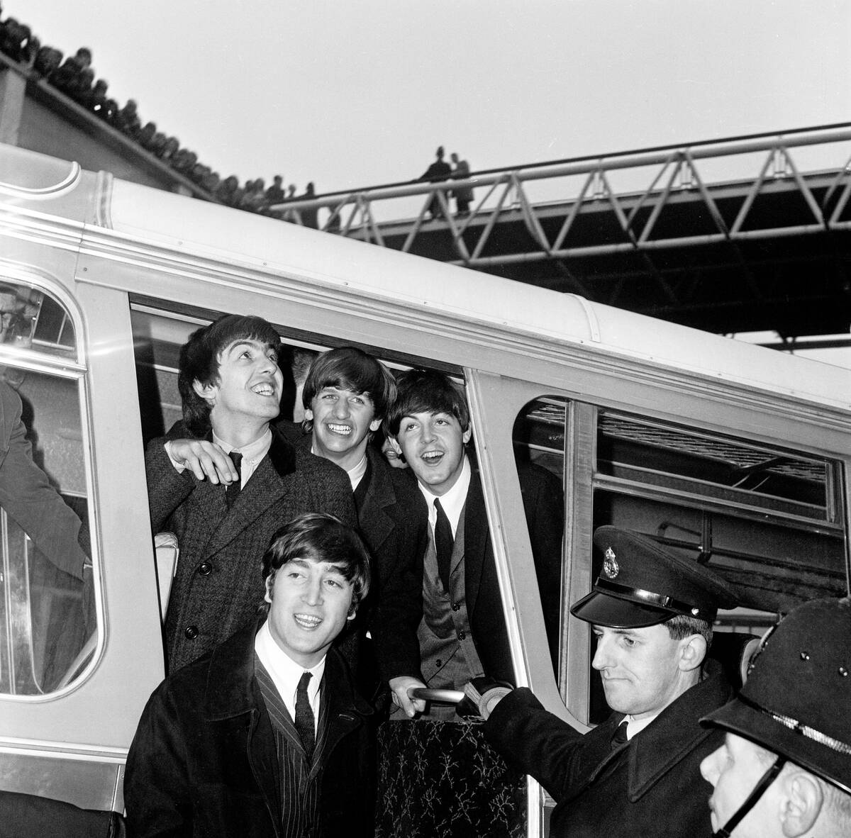 The Beatles return to London