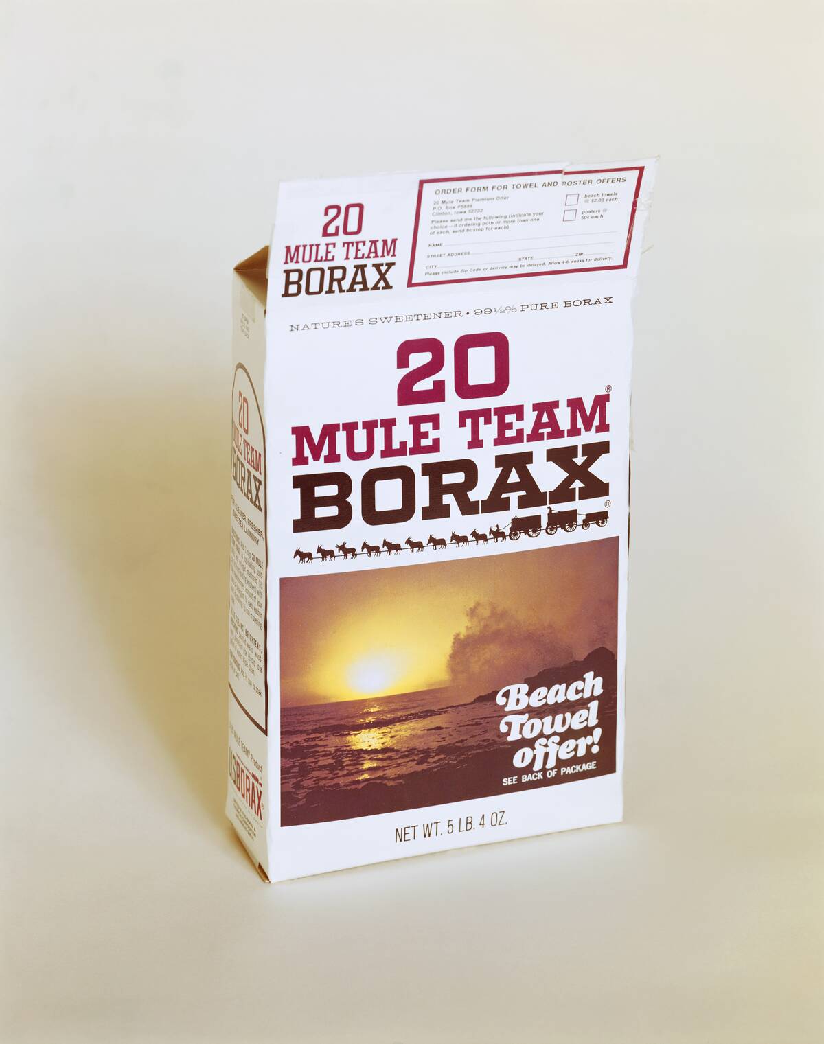 Carton of borax powder on white background, close-up