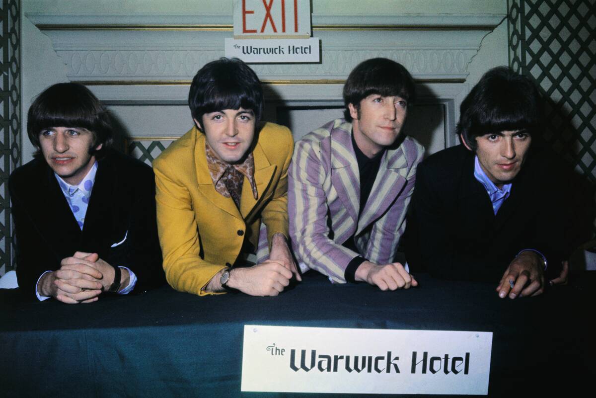 The Beatles Posing Together