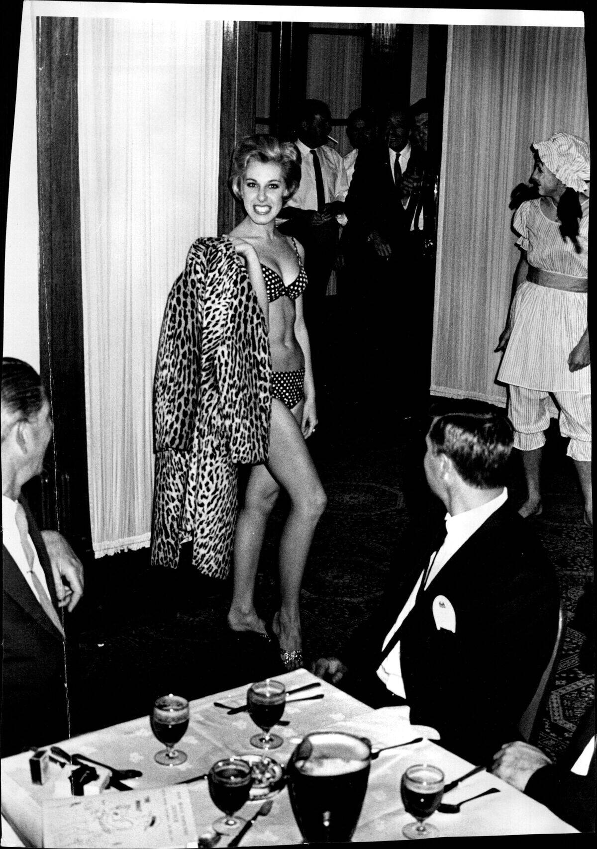 N. S. W. ***** dinner at the Hotel Bondi.Amusing interlude during the dinner when a bikini girl Carolyn Johnson of Bellevue Hill, appeared before the inspectors.
