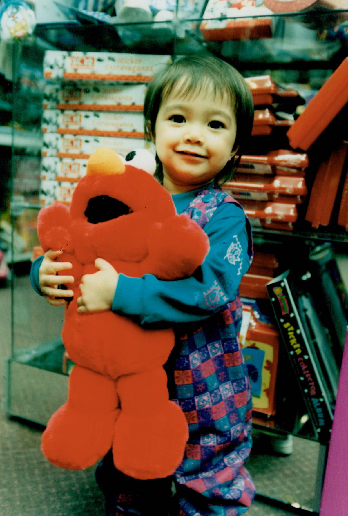 Nakita Byrne with Tickle Me Elmo doll...