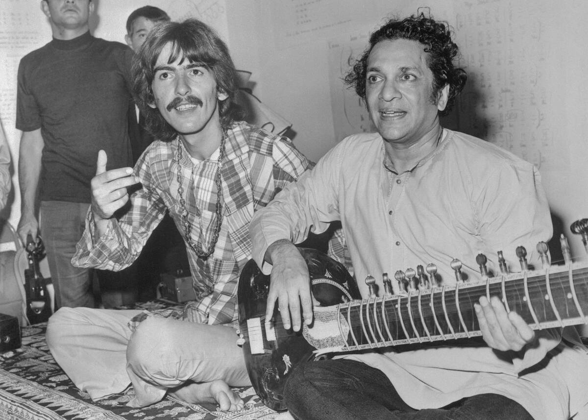George Harrison with Indian Musician