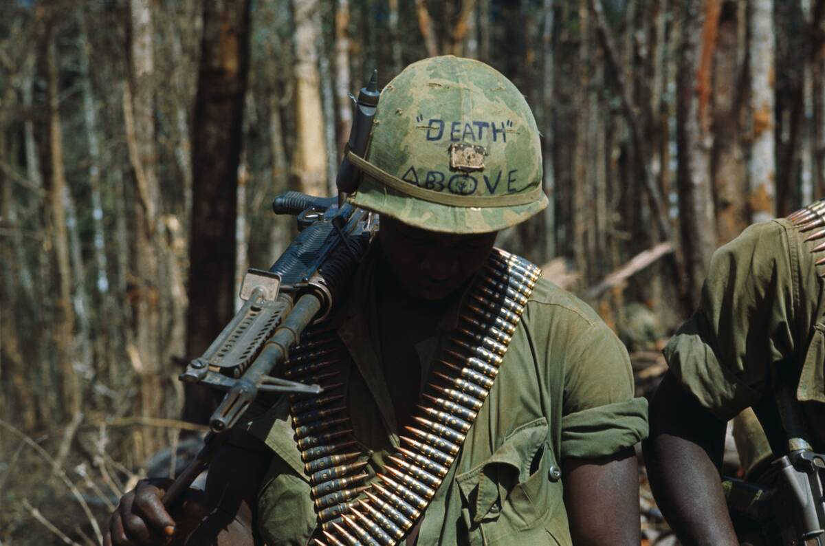 US Soldier Wearing Helmet with Message