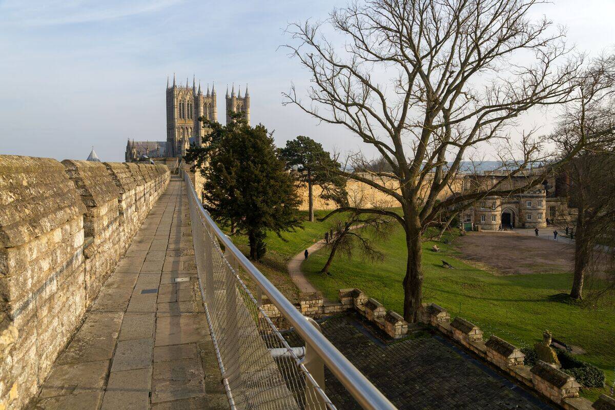 View to cathedral inside castle grounds from medieval wall walk, Lincoln Castle, city of Lincoln, Lincolnshire, England, UK