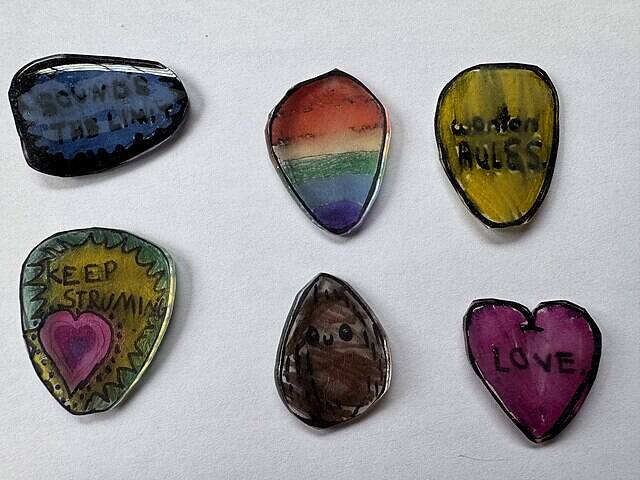 Custom_guitar_picks_made_from_polystyrene