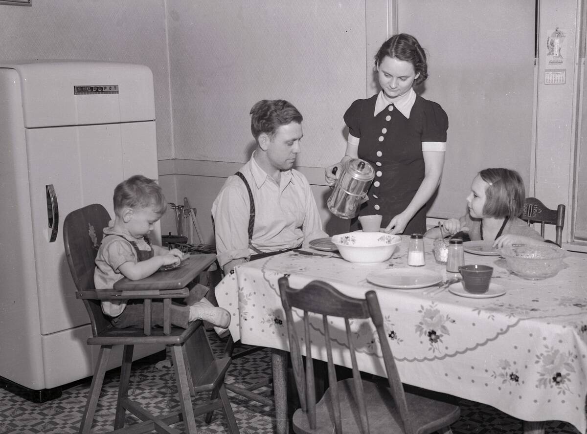 Harry Frowen and Family at Dining Room Table