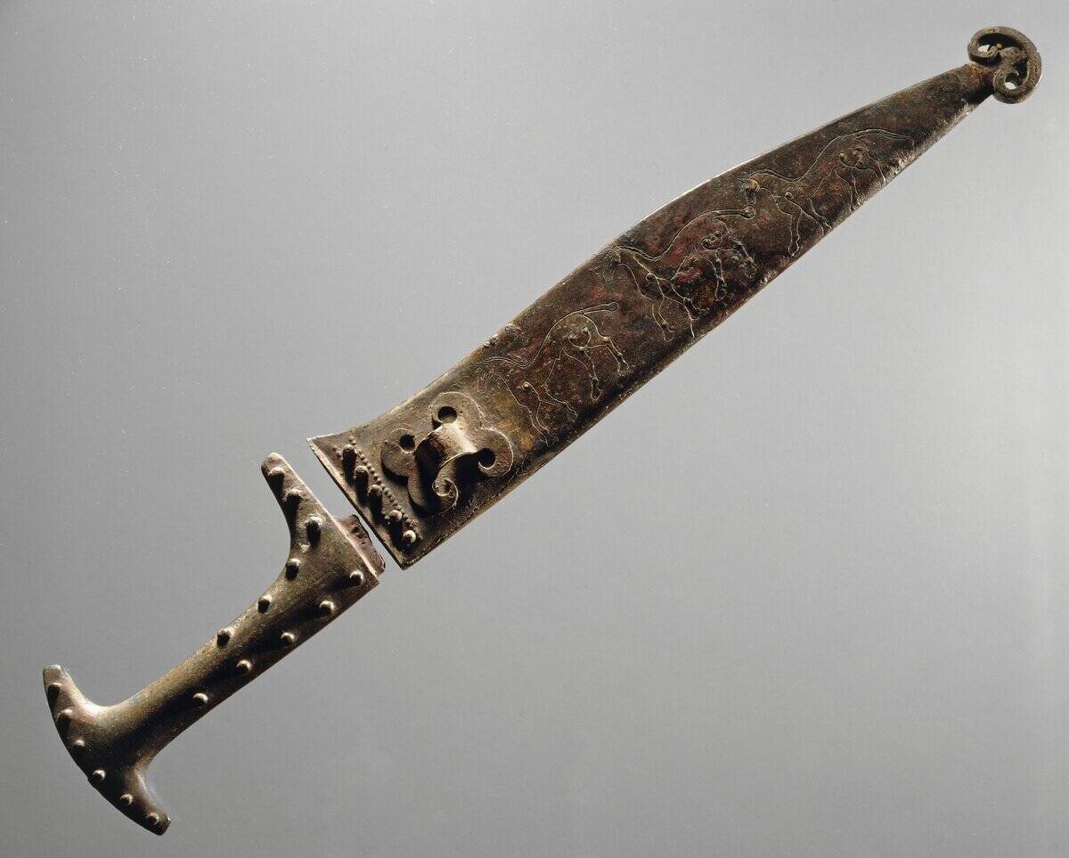 Iron knife with bronze handle and engraved scabbard depicting animals, Etruscan civilization, 6th century b.c.