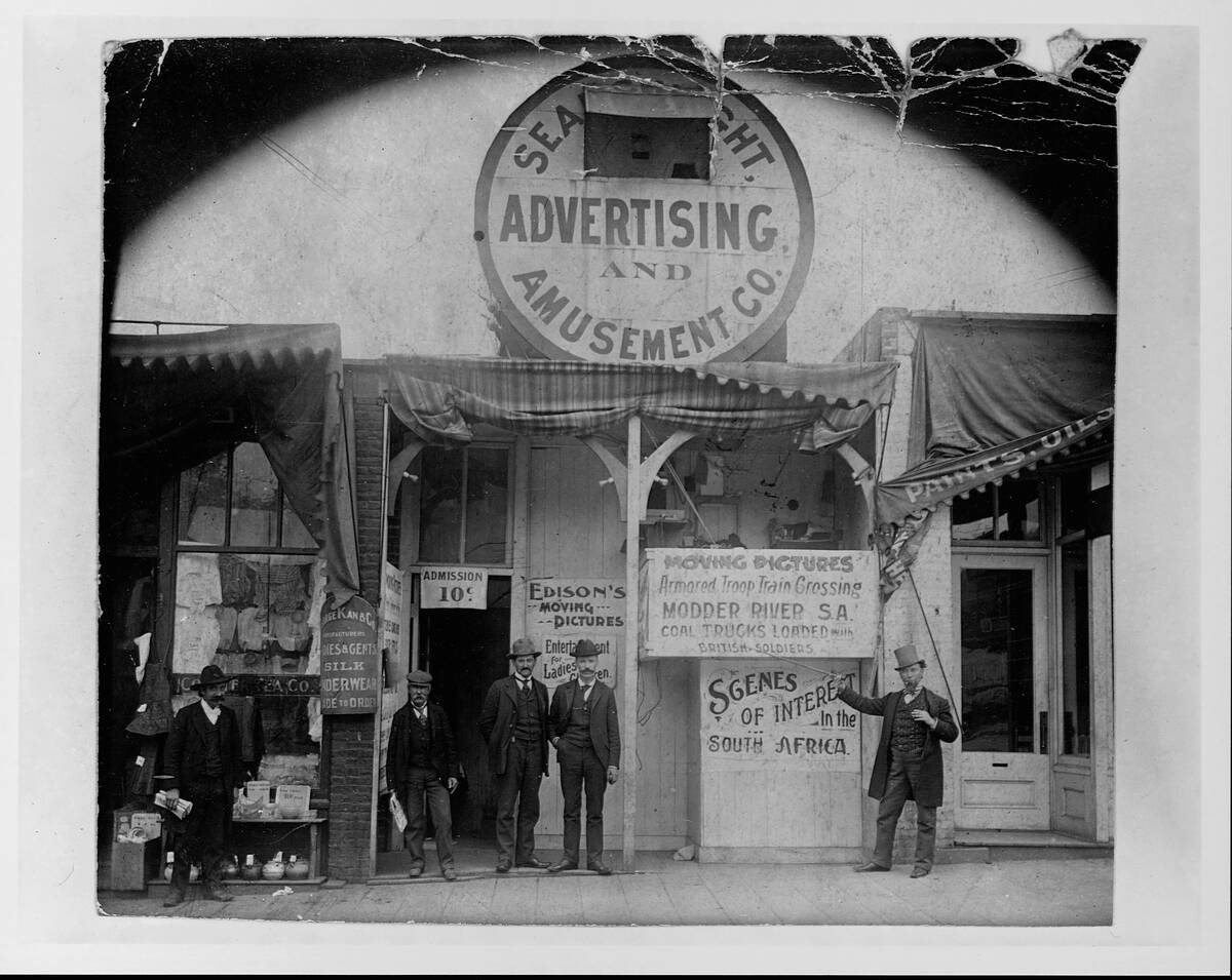 Man Highlighting Innovative Motion Pictures in Theater