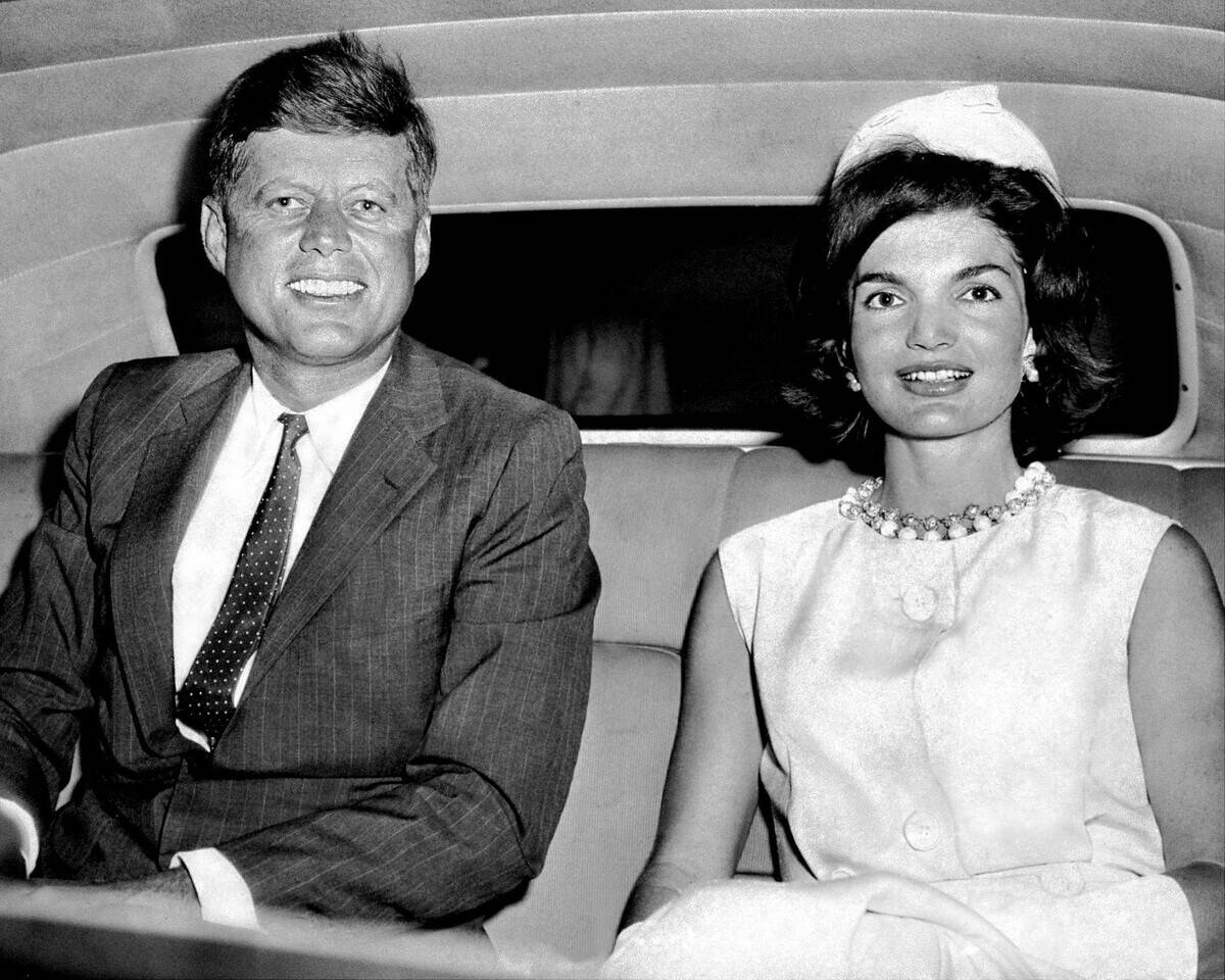 President John F. Kennedy with wife Jacqueline in car at Idl