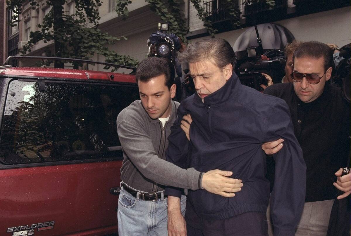 Vincent Gigante leaves for court.