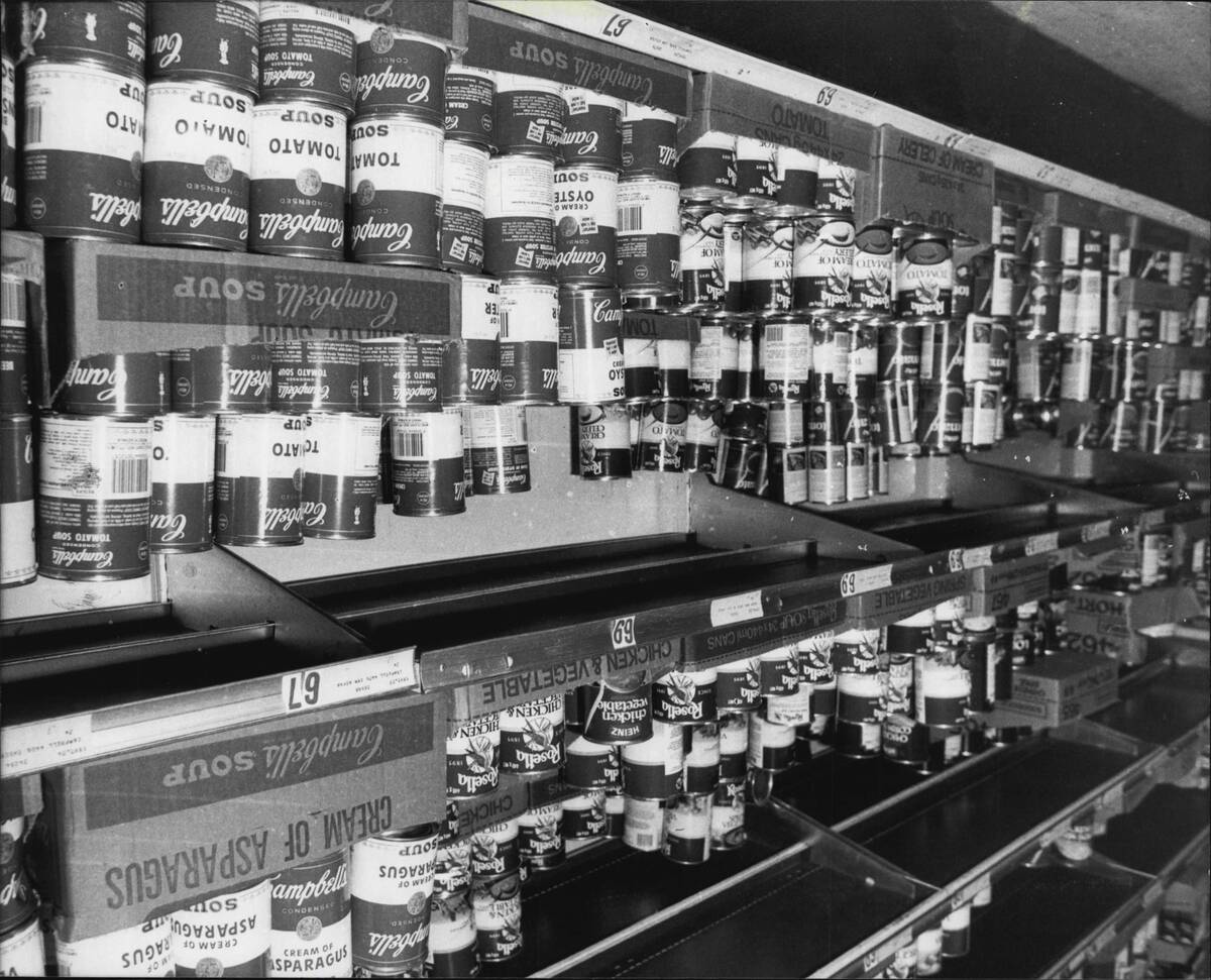 Wire story about Campbell Soup Company (US) and it's efforts to utdo it's competitors.Cans of Campbell's soup on a supermarket shelf.