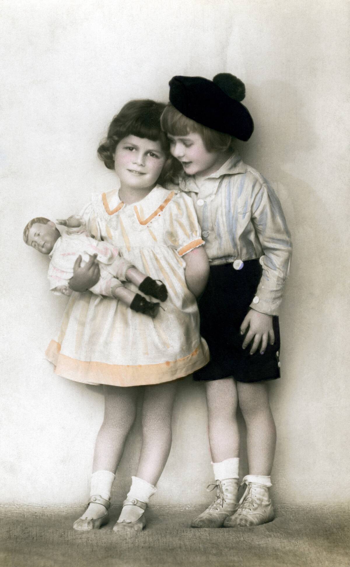 A young girl and boy, early 20th century.