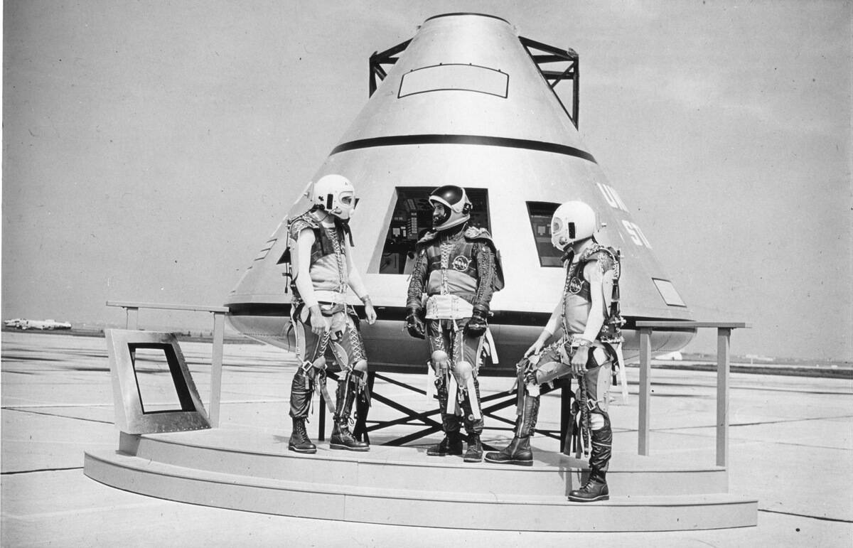 Astronauts With Apollo Capsule Model