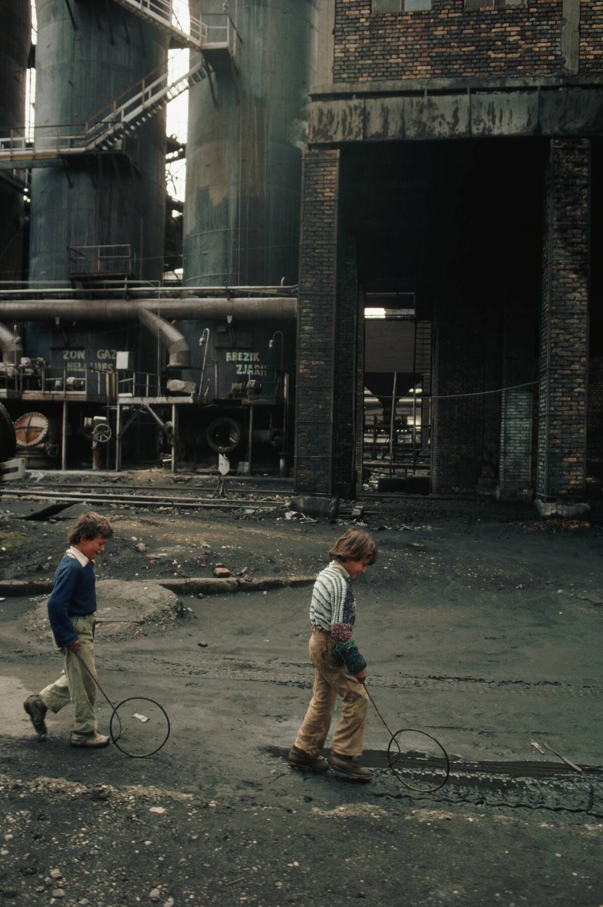 Boys Playing by Factory