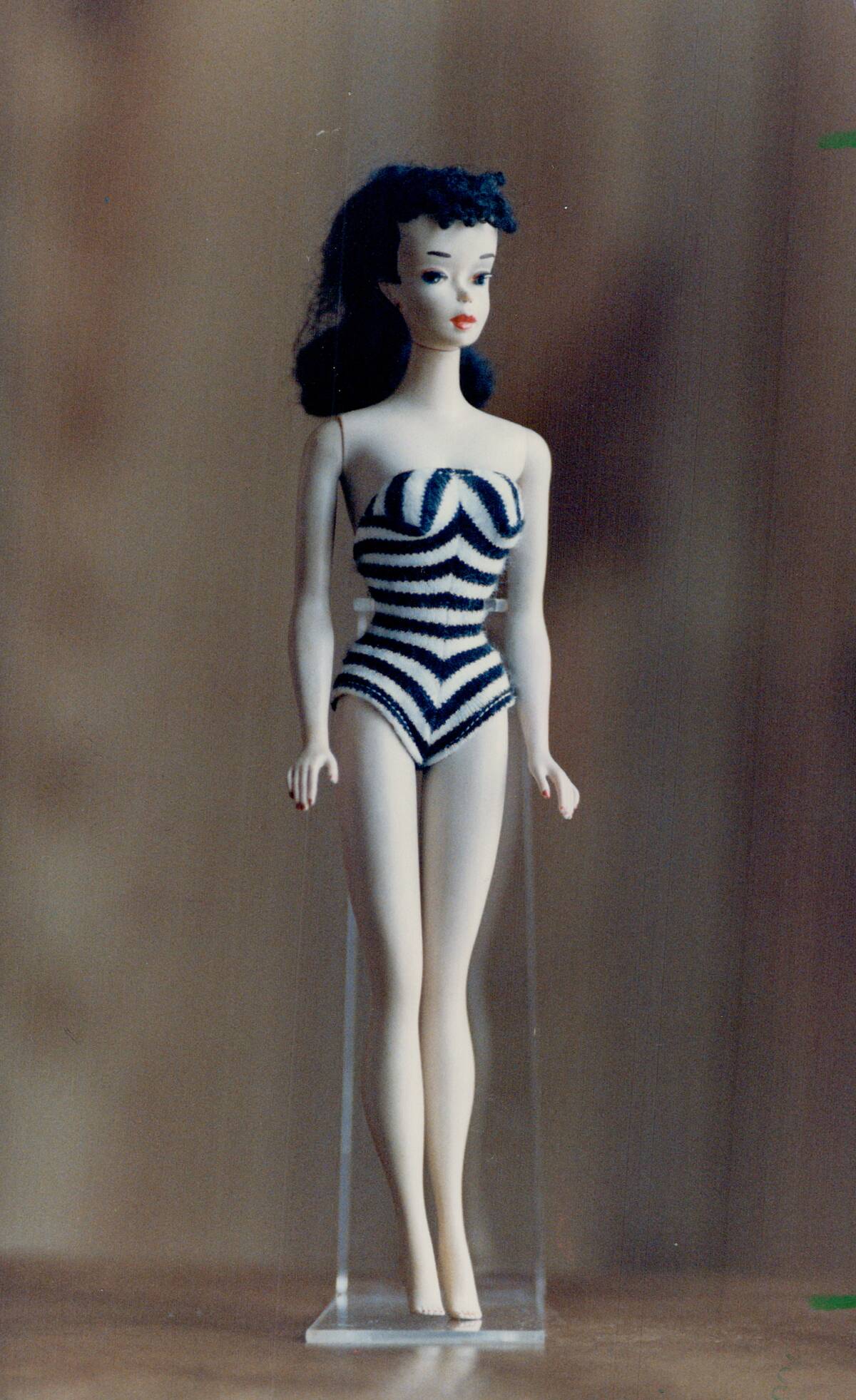 Classic looks: Barbie has changed little from the original; left to the most recent edition. An exte...