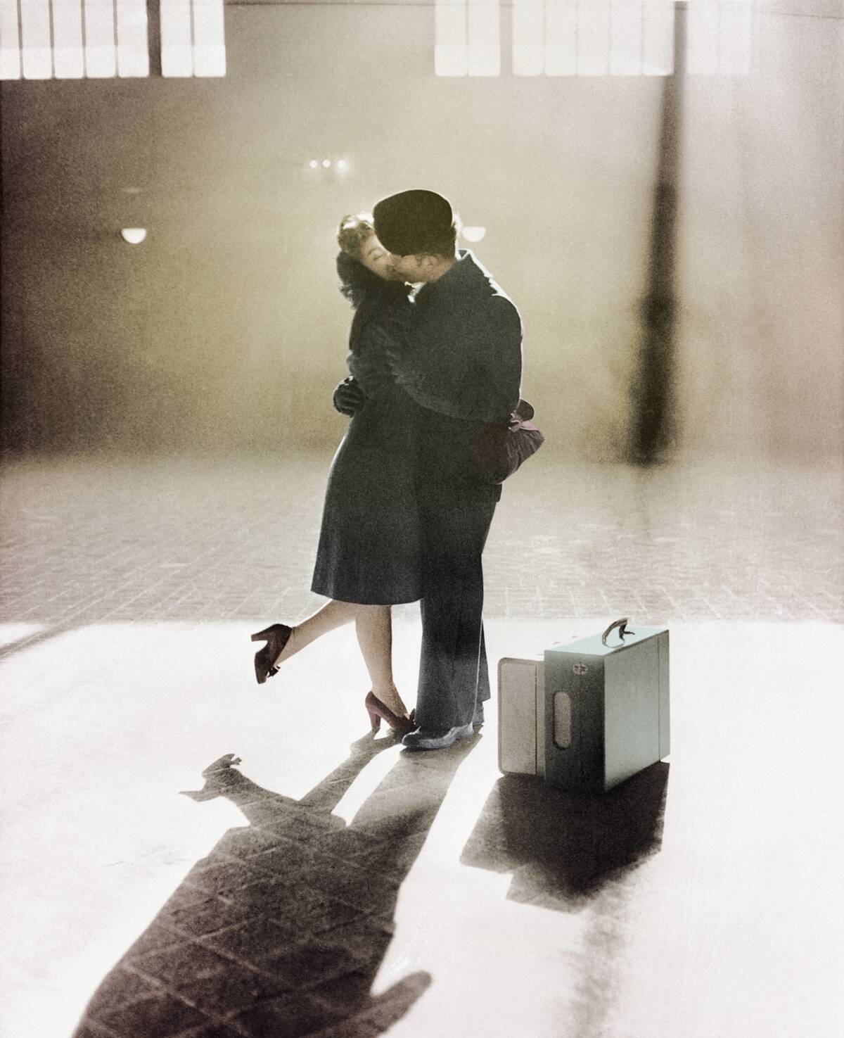 Couple Kissing in Train Station