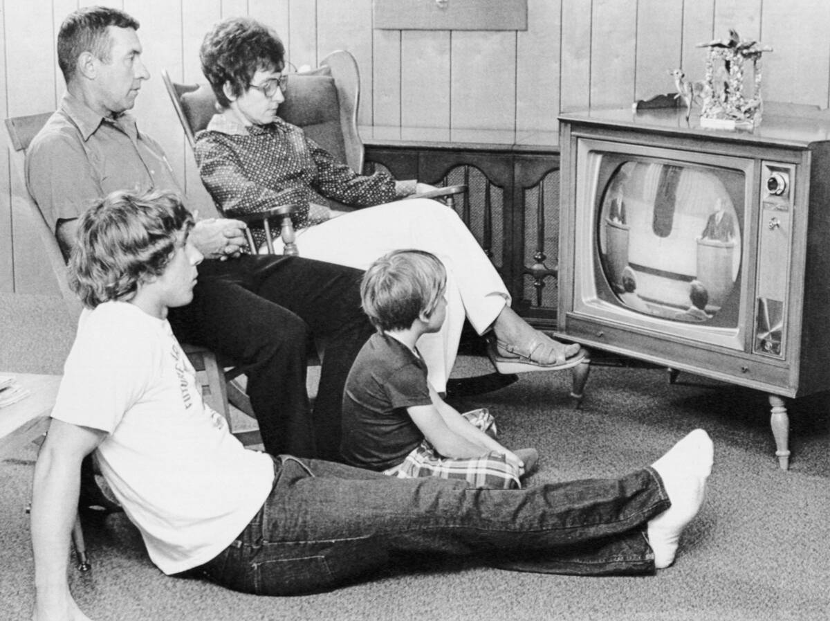 Family Watches Presidential Debate on TV