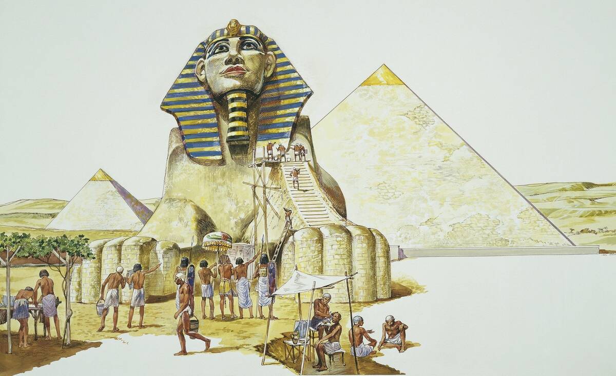 Group of people reconstructing The Sphinx, Giza pyramids, Giza, Egypt