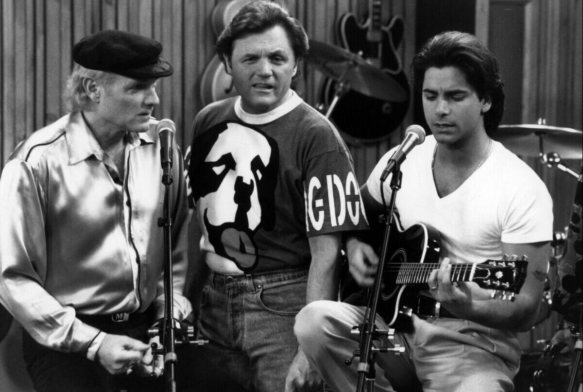 JOHN STAMOS WITH MIKE LOVE AND BRUCE JOHNSON OF THE BEACH BOYS