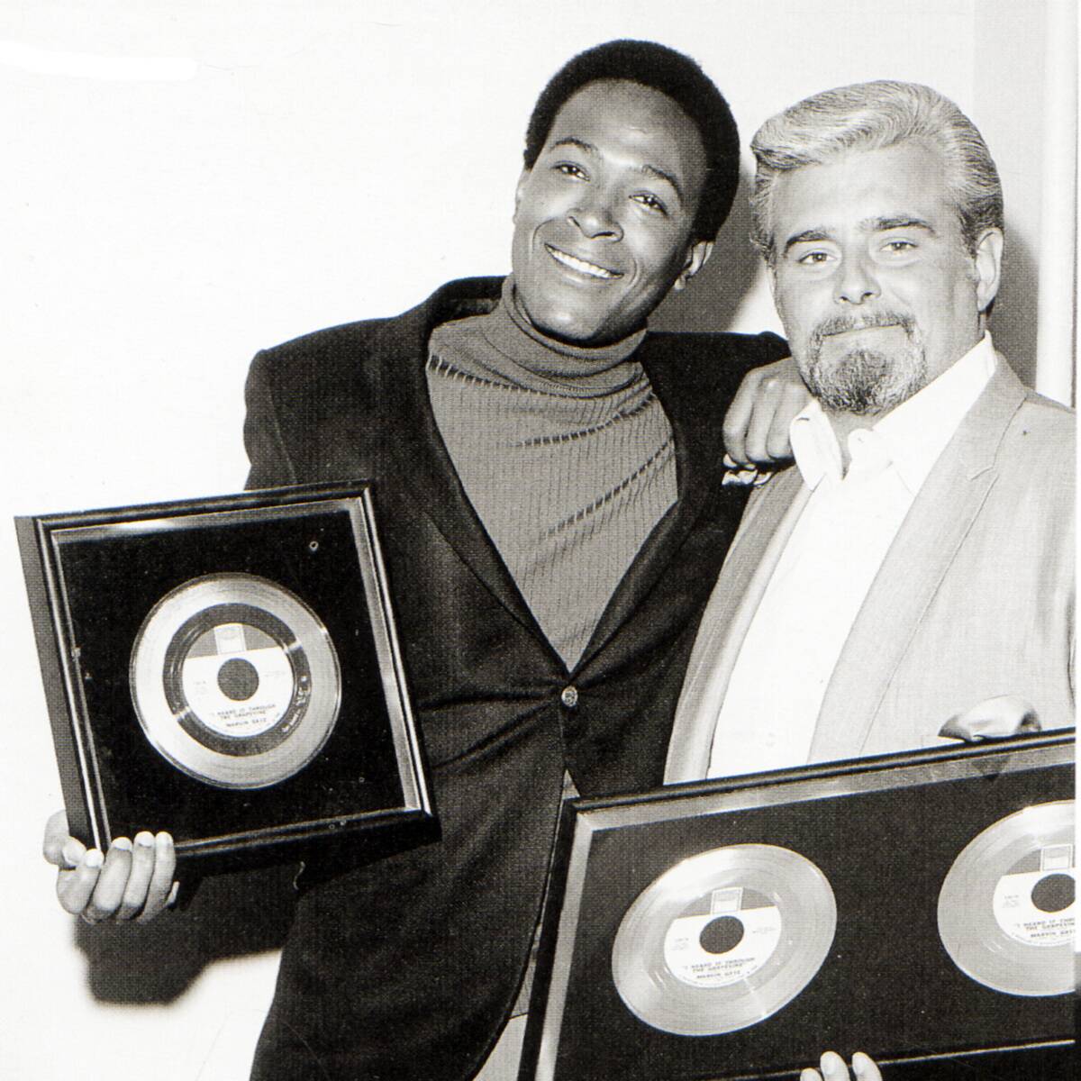 Marvin Gaye and Barney Ales posed with Gold Discs