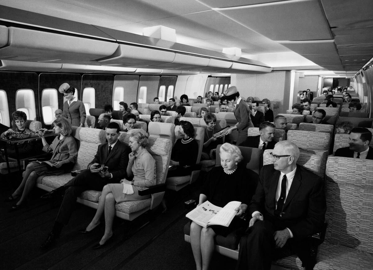 Passengers on a jumbo jet. 1960