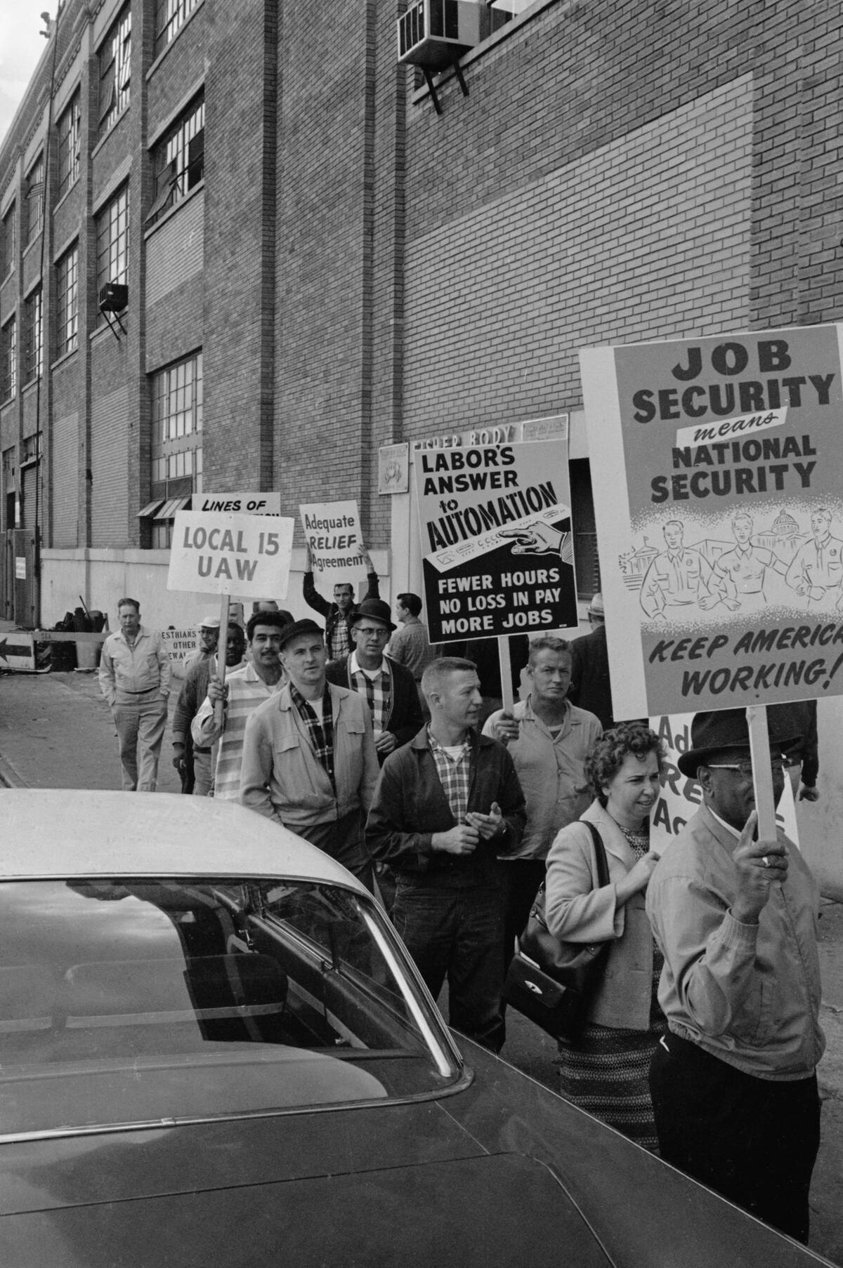 Striking Workers from Local 15 Picket with Signs