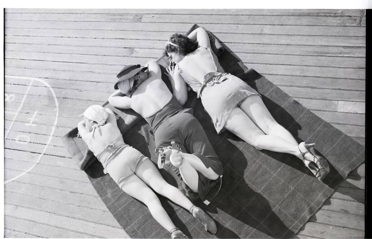 Three Women Sunbathing