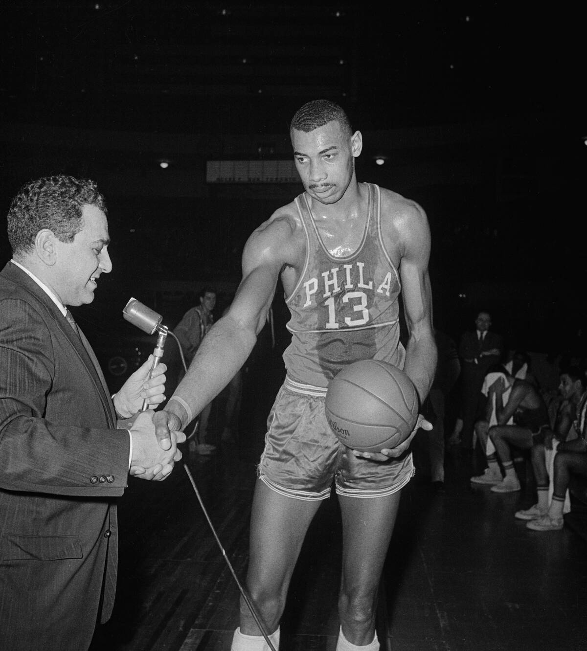 Wilt Chamberlain and Nick Kerbawy Shaking Hands