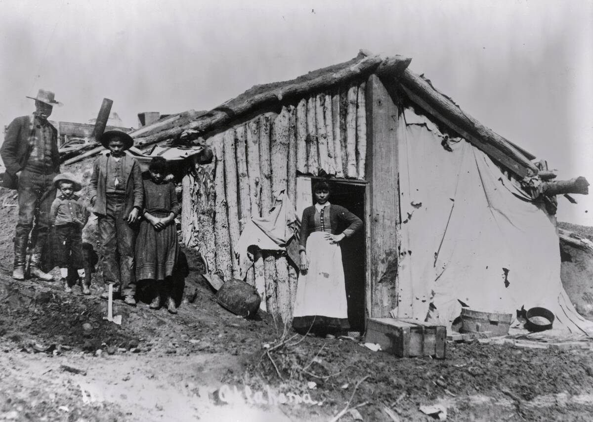 African American Family and Log Cabin