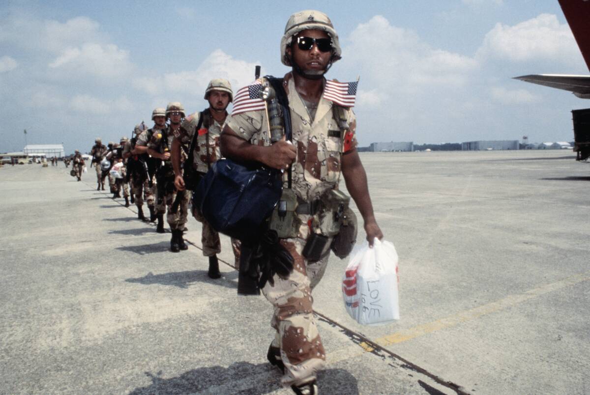 American Soldiers Marching to Airplane on Saudi Arabian Runway