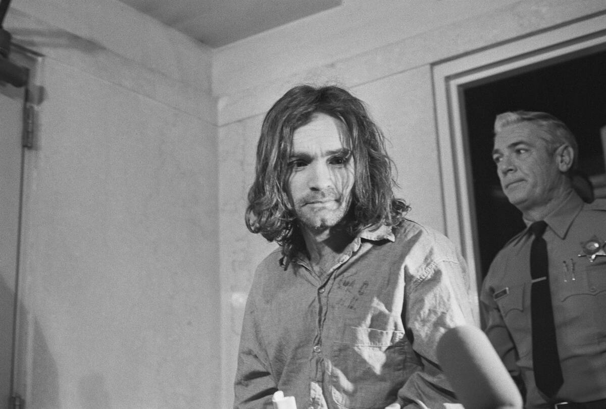 Charles Manson Being Escorted to Court